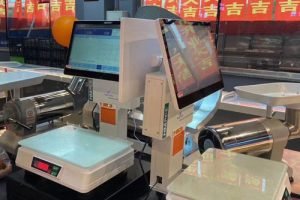 Cash-register-with-scale-in-use-in-the-Frsh-supermarket